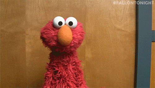 elmo shrugging